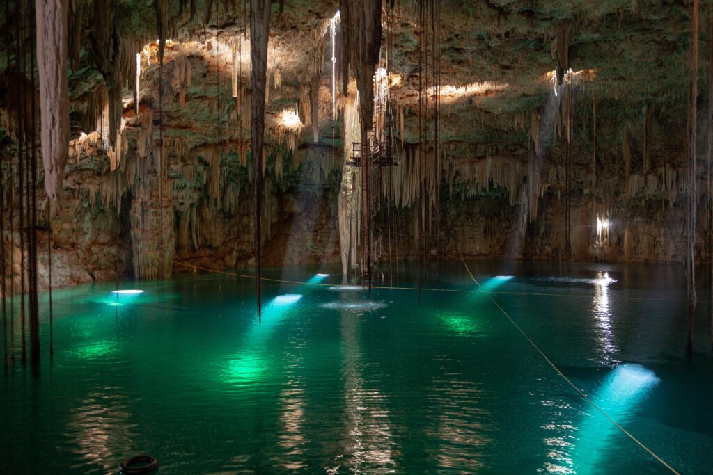 Cenote Taak be lum Cenote Taak be lum in Yucatán, Mexico with turquoise waters and stalactites.