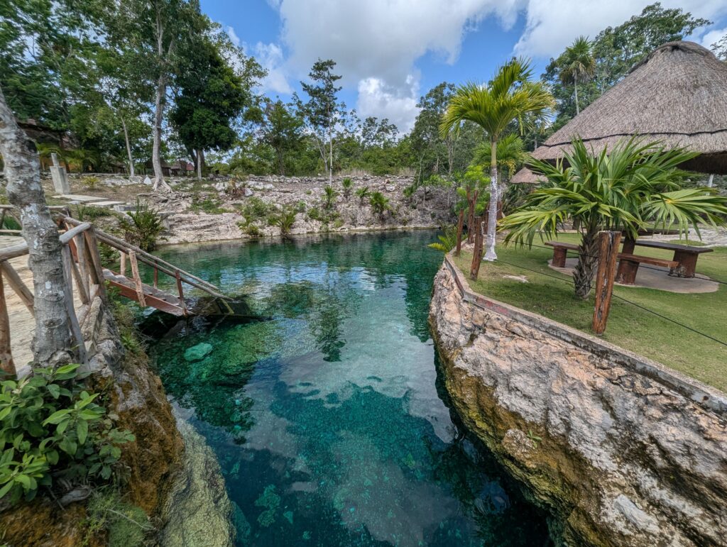 pexels photo 33667439 33667439 Tranquil natural pool surrounded by lush greenery in Tulum, Mexico, perfect for relaxation.